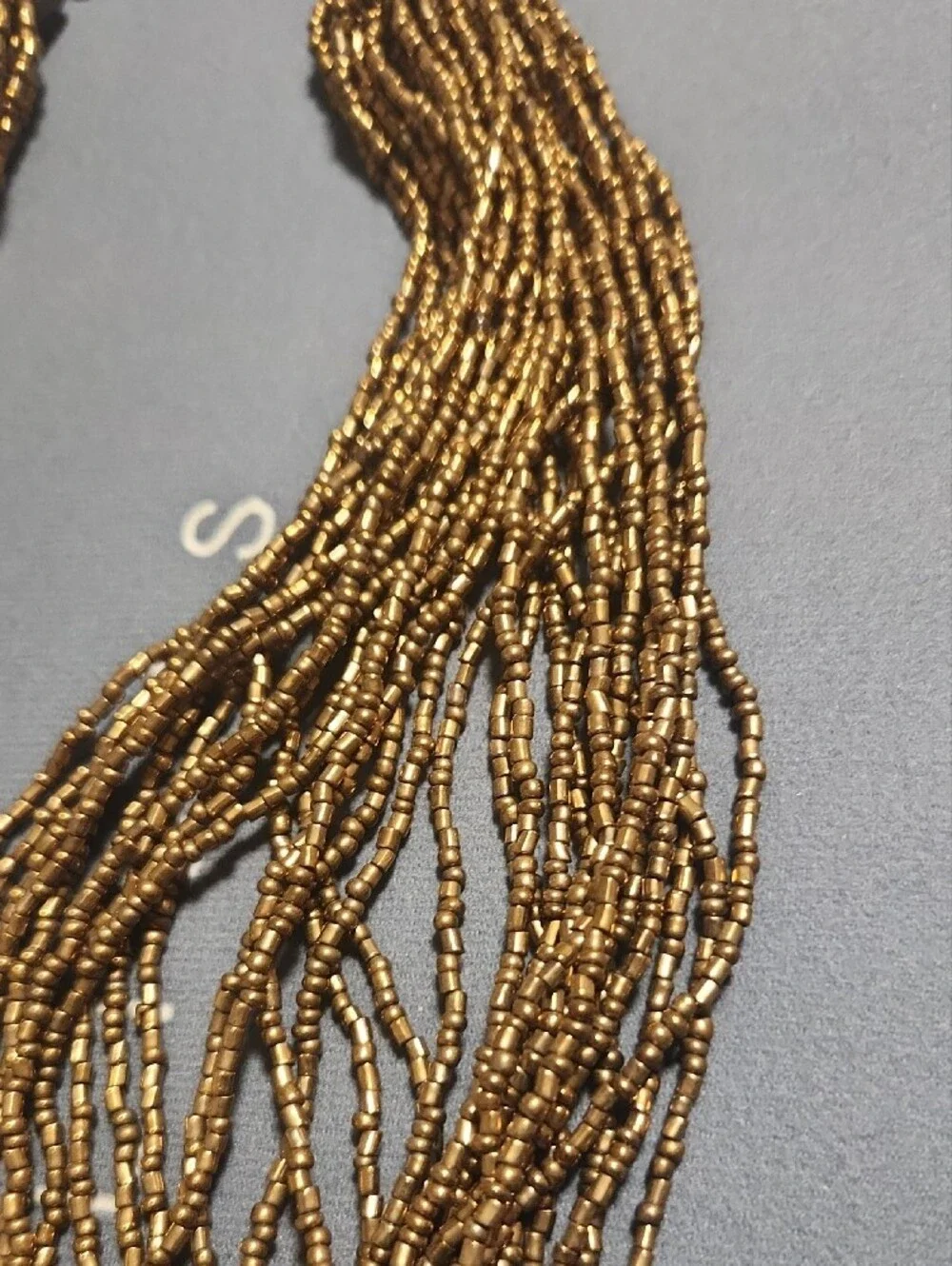 paparazzi Shimmering Gold Multi-Strand Beaded Necklace